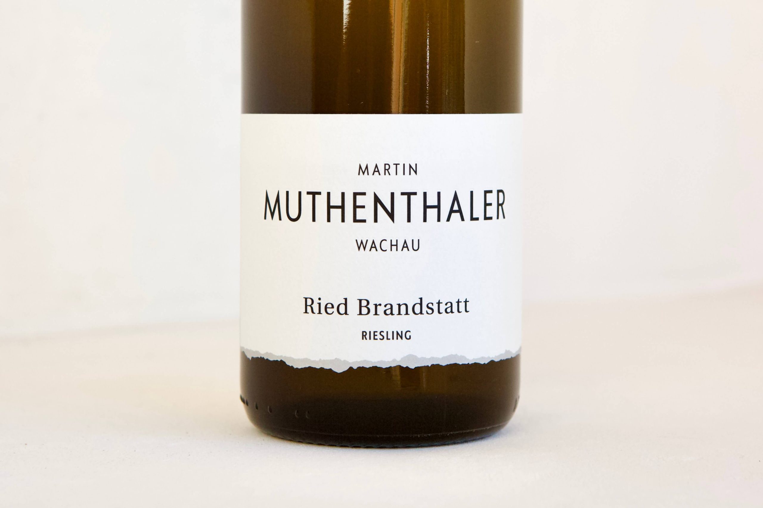 Close-up of a bottle of Riesling Ried Brandstatt