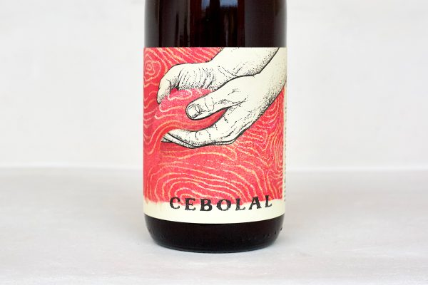 Herdade do Cebolal Portuguese red wine bottle label featuring illustrated hands artwork