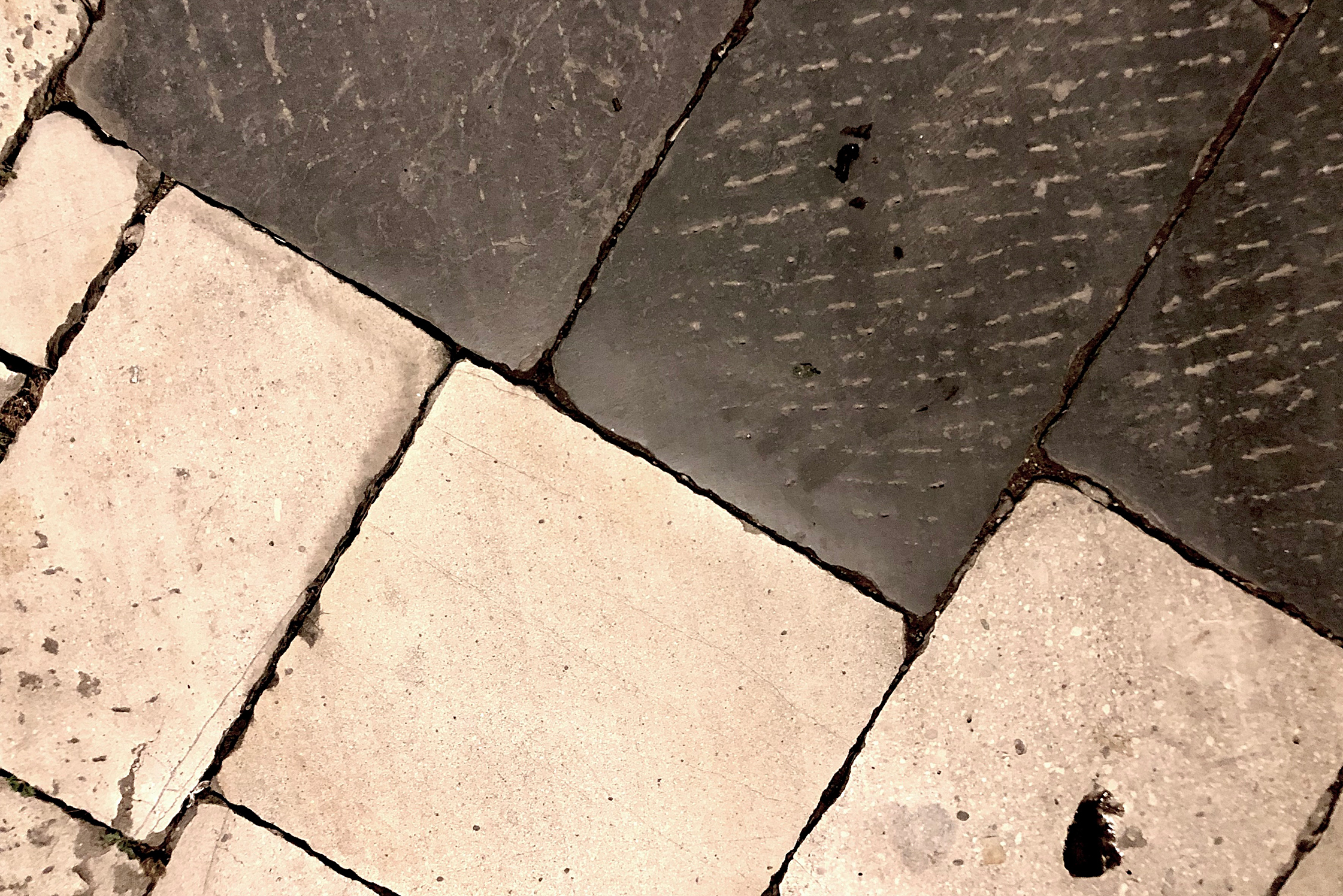 The streets of Venosa, limestone alongside volcanic rock